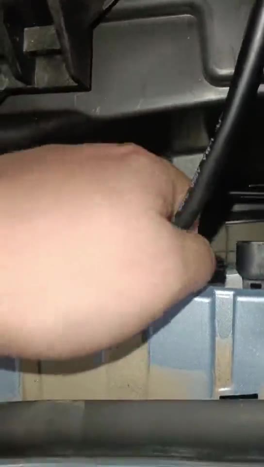 Feed the new cable through the opening shown.